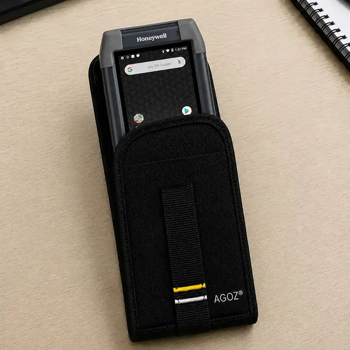 Honeywell mobile computer seated in an Agoz handheld holster, showing front device access and protective canvas carry design.