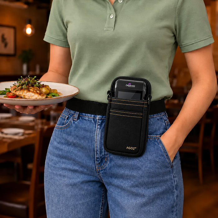 Restaurant worker wearing black Dejavoo POS waist holster