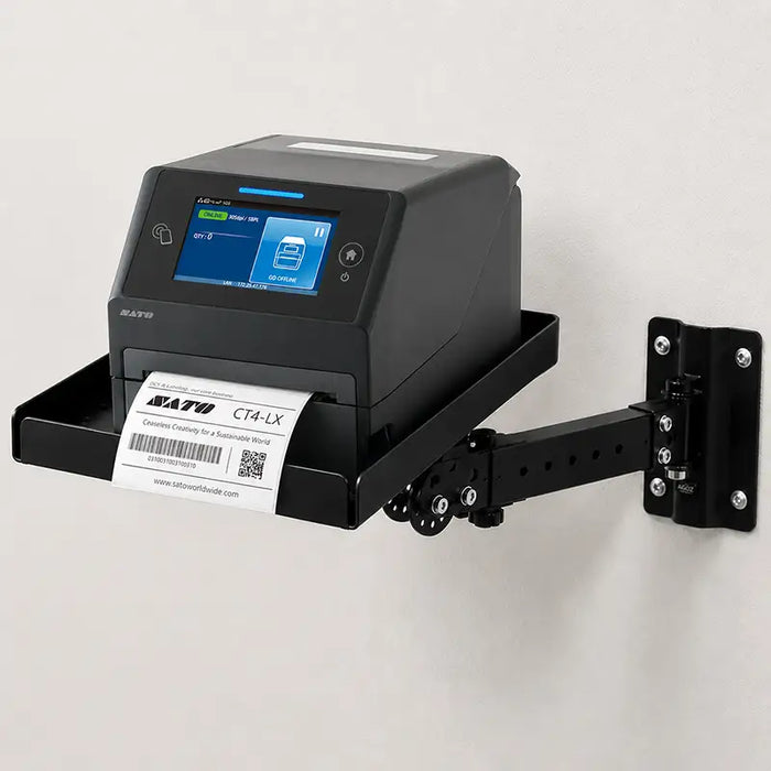 SATO desktop label printer mounted on a black AgozTech printer shelf wall mount with adjustable arm.