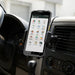 Newland mobile computer secured in an air vent vehicle cradle holder inside a commercial vehicle dashboard.